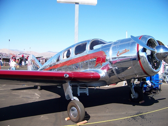 Photo By Bill Stansbeary. Steve Marini received the Paul E. Garber Trophy for his 1937 Spartan Executive 7W. The Spartan also won the National Aviation Hall of Fame’s People’s Choice Award, voted on by thousands of spectators attending the invitational. Via Airport Journals